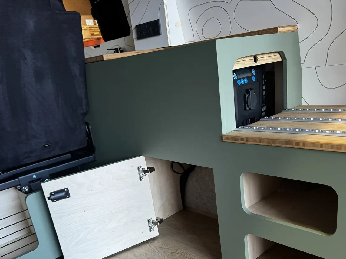 The fuse box is in the cupboard underneath the Clayton