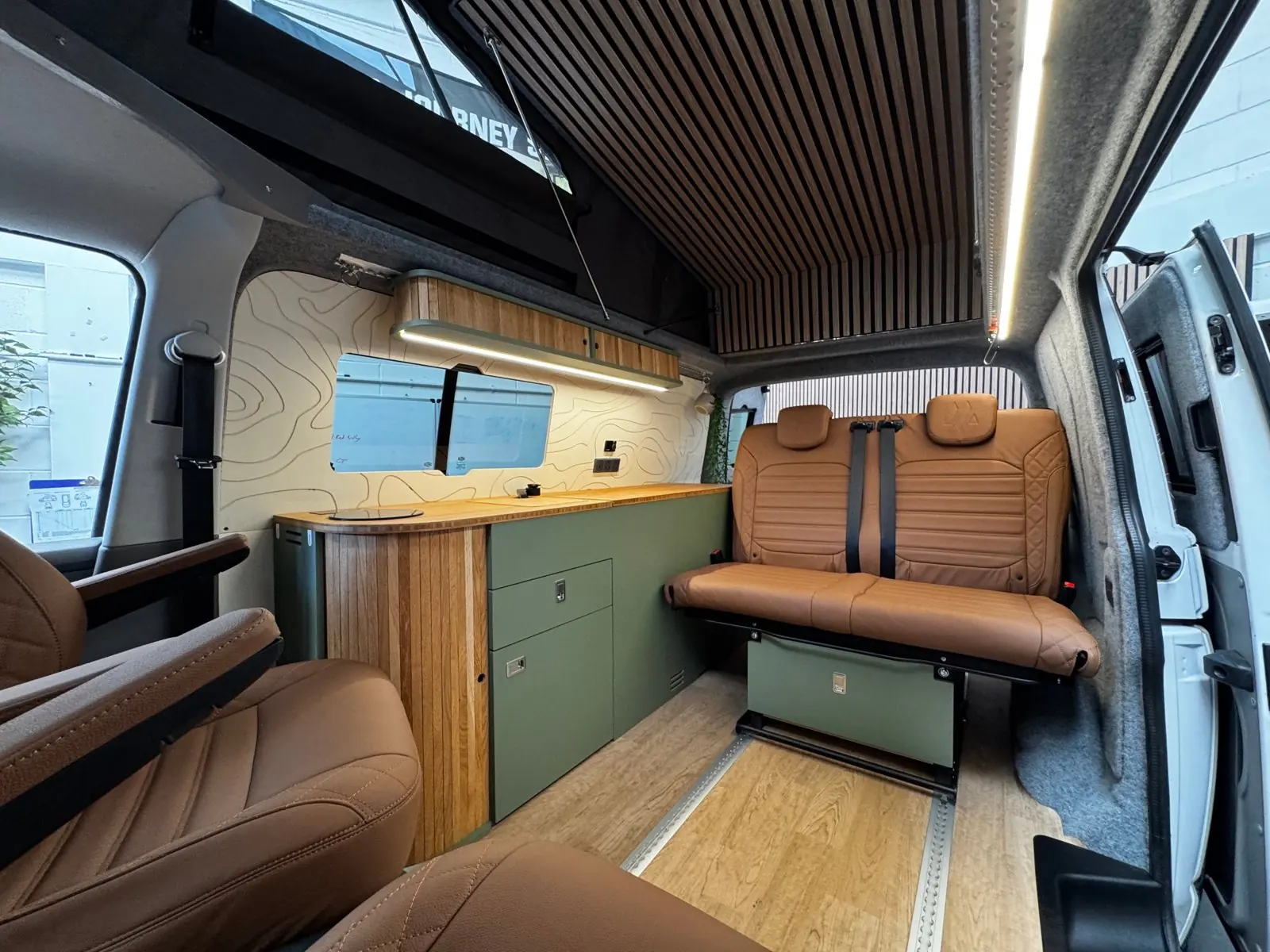 Birch plywood furniture inside a Maverick Expedition layout