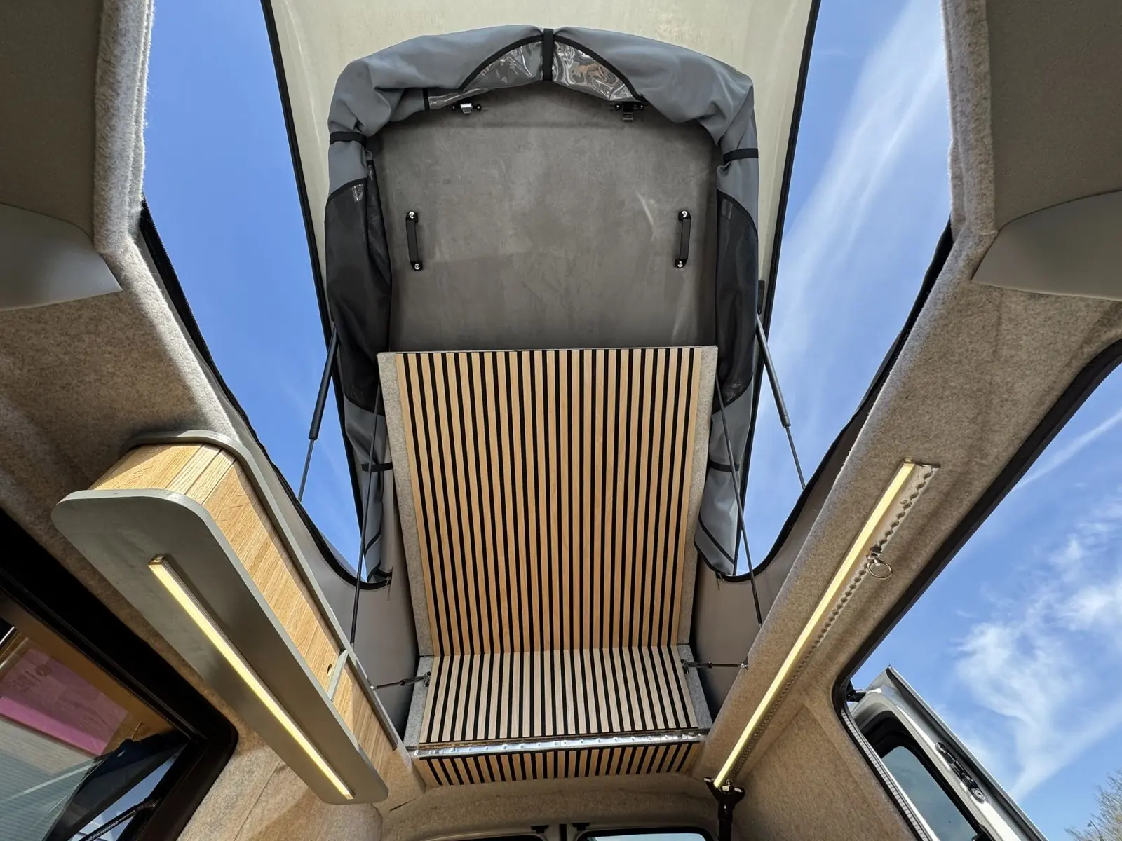A Maverick camper with its Austops pop-top roof raised